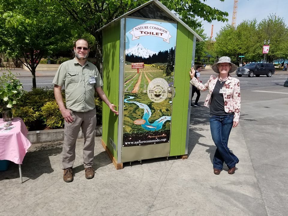 Rich Haskell, Nature Commode's lead designer and fabricator, and Nicole Cousino, owner, showcase the company's newest unit, The Rhododendron, designed for construction sites and long-term placements. Photos courtesy of Nature Commode.